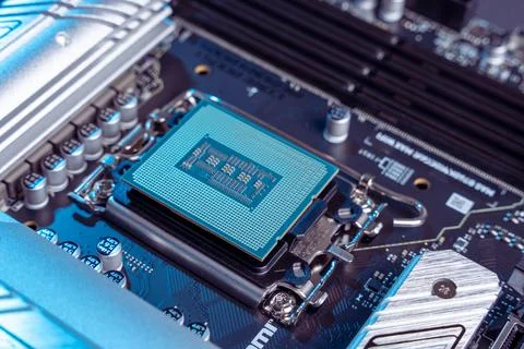 Processor in the motherboard socket is a close-up. modern powerful Stock Photos