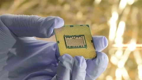 Processor for neural engine in gloved hand of scientist in research laboratory Stock Footage 163733405
