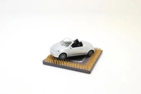 A processor over white background with car and binary code inside Stock Photos