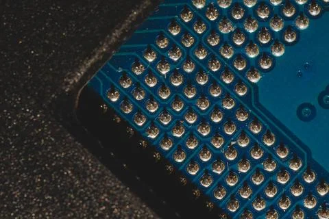 Processor pins macro. computer motherboard close up. cpu pins on a circuit bo Stock Photos