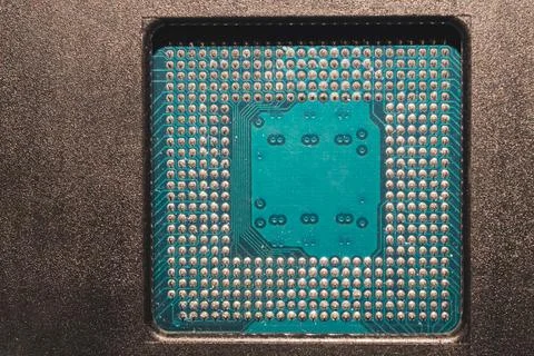 Processor pins macro. computer motherboard close up. cpu pins on a circuit bo 写真素材