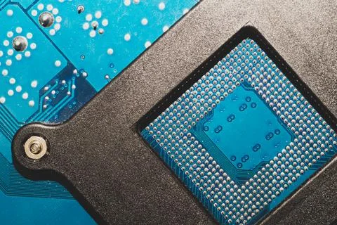 Processor pins macro. computer motherboard close up. cpu pins on a circuit bo Foto stock