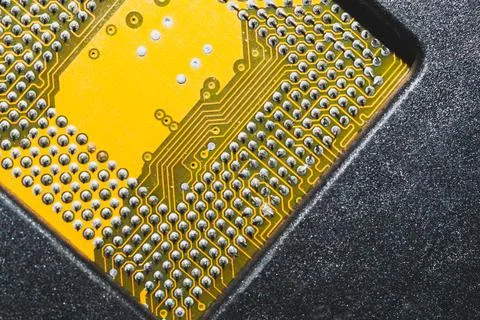 Processor pins macro. computer motherboard close up. cpu pins on a circuit bo 写真素材