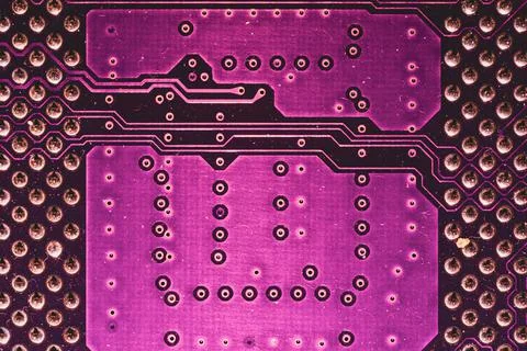 Processor pins macro. computer motherboard close up. cpu pins on a circuit bo 写真素材