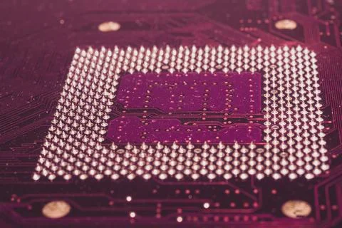 Processor pins macro. computer motherboard close up. cpu pins on a circuit bo 写真素材