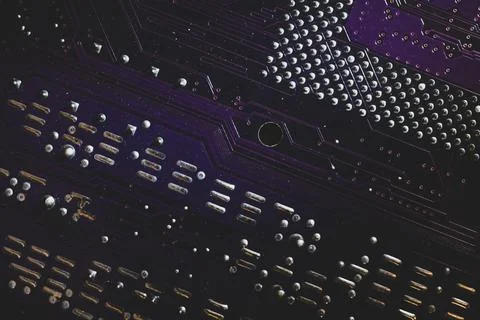 Processor pins macro. computer motherboard close up. cpu pins on a circuit bo Stock Photos