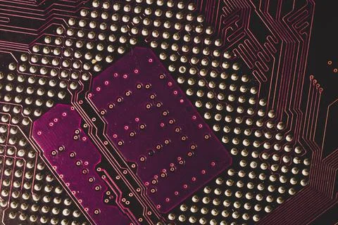 Processor pins macro. computer motherboard close up. cpu pins on a circuit bo Stock Photos