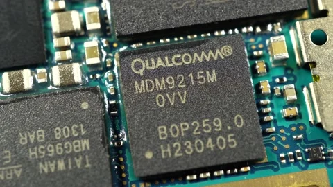 Processor Qualcomm. Slide shot of the electronic circuit board. Close-up of d Stock Footage 204855290