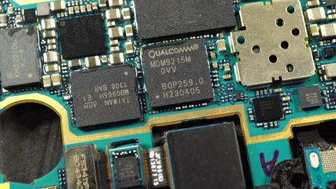 Processor Qualcomm. Slide shot of the electronic circuit board. Close-up of d Stock Footage 219991009