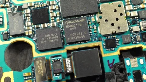 Processor Qualcomm. Slide shot of the electronic circuit board. Close-up of d Video stock 244335174