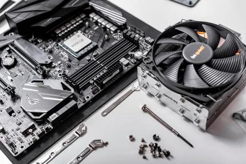 Processor Ryzen 7 2700X against the background of a computer motherboard Asus 스톡 사진