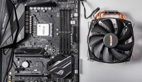 Processor Ryzen 7 2700X against the background of a computer motherboard Asus Foto stock