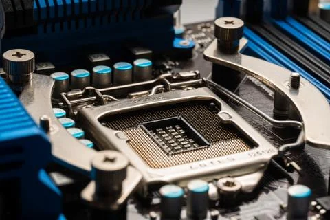 Processor socket on motherboard computer motherboard with blue heatsinks and  写真素材