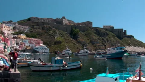 Procida island, panoramic view to the left of the port of Corricella Stock Footage 148633353