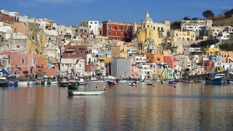 Procida, Naples, Italy. Panoramic shot of motley colored fishing village on the Video stock 128488124