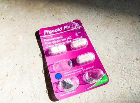 Procold flu in soft-focus in the background Stock Photos