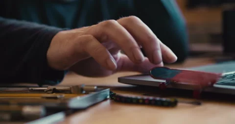 Procrastination and unwillingness to work. A man plays with a small toy Video stock 182437950