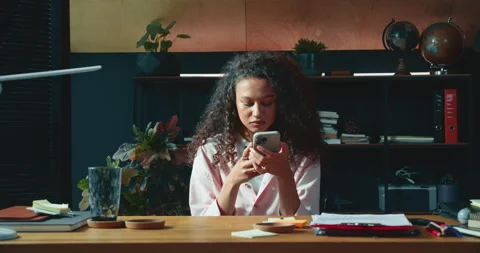 Procrastination concept. Beautiful stressed young mixed race woman works from Stock Footage 232878310