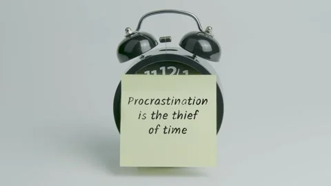 Procrastination is the thief of time Text or Word on Yellow Note Paper Stick Stock Footage 300153756