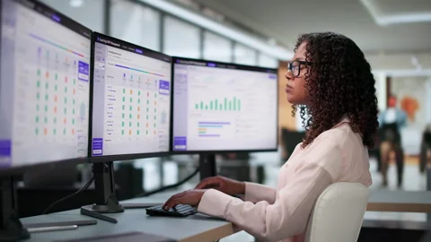Procurement Manager Analyzes Supplier Bids On Computer Stock Footage 339188006