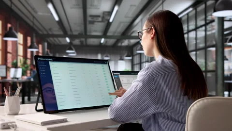 Procurement Manager Analyzes Supplier Data Stock Footage 333399950