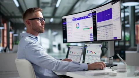 Procurement Manager Analyzes Supplier Data On Laptop Stock Footage 347895521