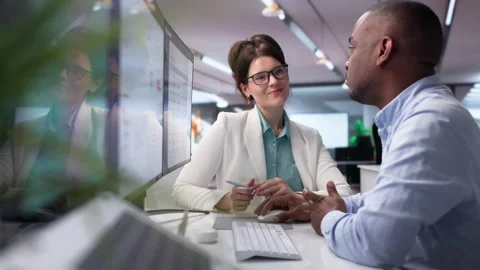 Procurement Manager And Analyst Discuss Software Platform Sourcing Smart Stock Footage 341003399
