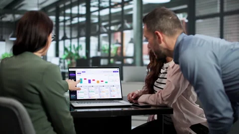 Procurement Manager Discusses Spending Strategy With Analysts Stock Footage 347906358