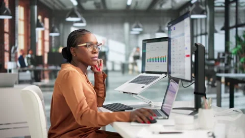 Procurement Manager Reviews Supplier Contracts Using Enterprise Software Stock Footage 337645166