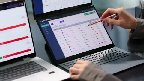 Procurement Manager Reviews Supplier Contracts Vidéo 344714710
