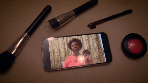 Produce an engaging makeup tutorial with beauty products, filmed on your 動画素材 276392241
