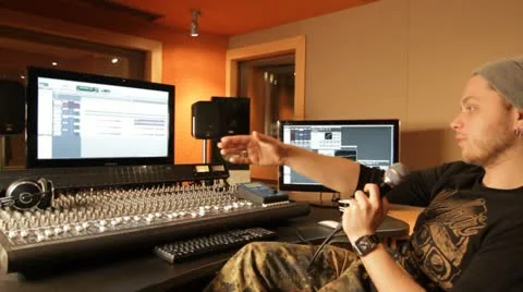 Producer explaining something in recording studio Stock Footage 21750501