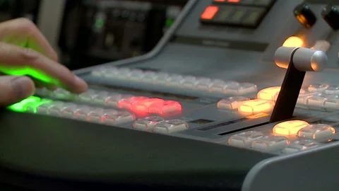 Producer working with control desk in studio. Video stock 91768853