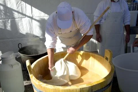 Producers while producing mozzarella, during the demonstration of the general Stock Photos
