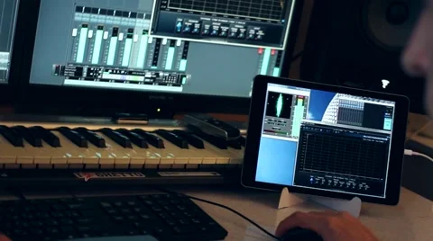 Producing electronic music Stock Footage 64299174