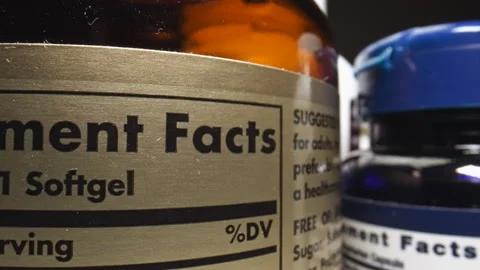 Product Description Label of Nutritional Supplements Jars Stock Footage 321118968