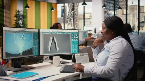 Product developer uses solar cell technology to create green energy based gadget Stock Footage 315618776