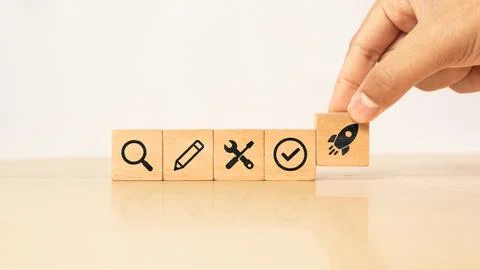 Product development and launch concept. Wooden blocks with research, design.. Stock Photos