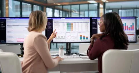 Product Manager Analyzes Website Split Test Data Using Desktop Analytics Tool Stock Photos