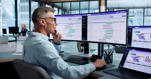 Product Manager Reviews A B Testing Data On Laptop To Improve Website. Stock Photos