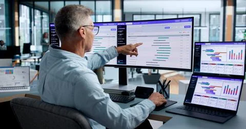 Product Manager Studies A B Test Data On Laptop To Improve Website Conversion Stock Photos
