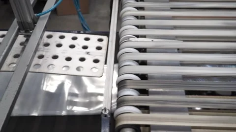 Product packaging concept. Plastic bag manufacturing process Stock Footage 252486091