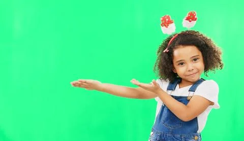 Product placement, green screen and portrait of a child doing a presentation on Stock Photos