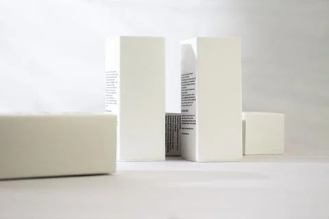 Product shot of four white rectangular boxes with copy space for text and brandi Stock Photos