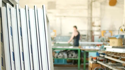 The production of assembling and manufacturing pvc windows, the shop with Stock Footage 95127555