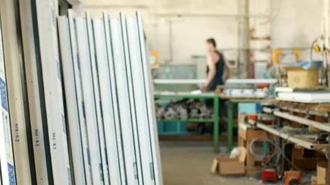 The production of assembling and manufacturing pvc windows, the shop with Stock Footage 95834441
