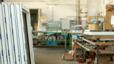 The production of assembling and manufacturing pvc windows, the shop with Stock Footage 95879853