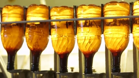 Production of beer in plastic bottles Stock Footage 69708093