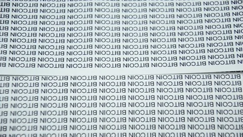 Production of bitcoins. The concept of producing a large number of bitcoins Video stock 84865741