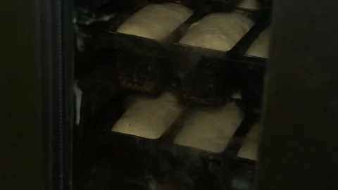 Production of bread. Bread in forms to proofing Stock Footage 71890128
